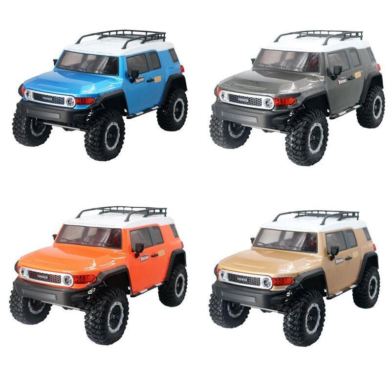 A set of four remote control trucks in different colors (blue, orange, gray, and yellow). Each truck has a portable design with large off-road tires, a clear windshield, and LED lights.